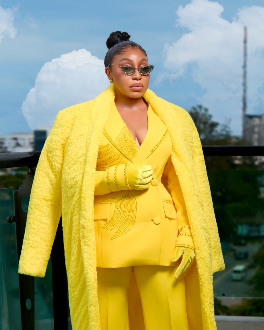 Rita Dominic Yellow Suit